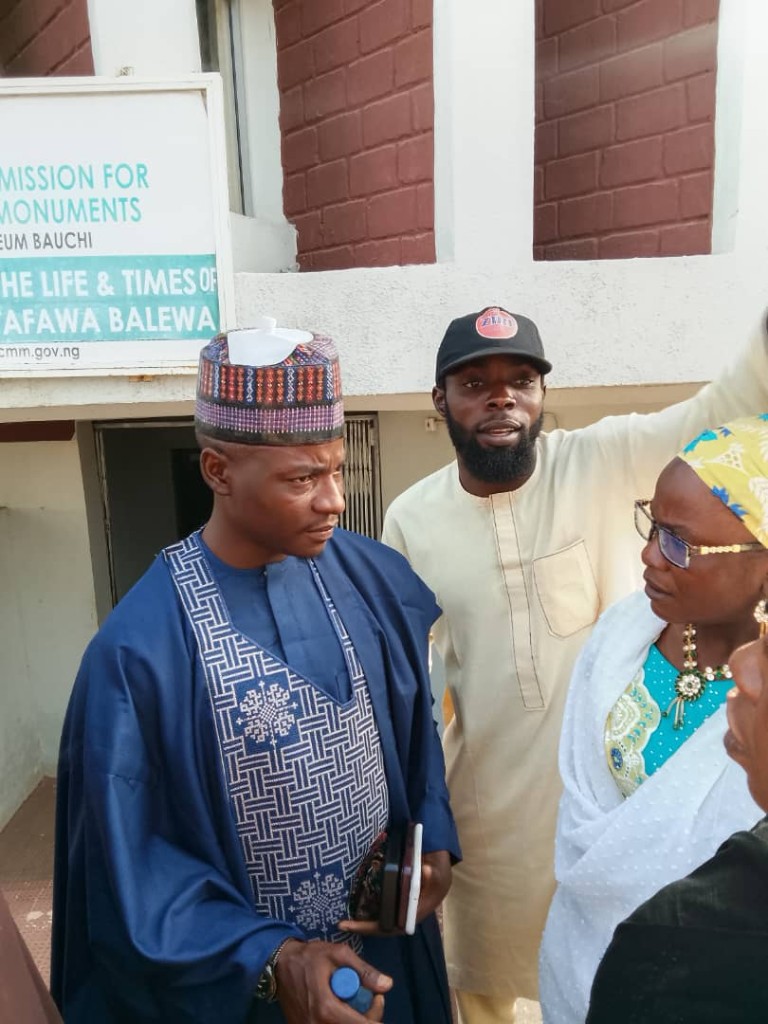 A conversation in front of the exhibition on the life and times of Sir Abubakar Tafawa Balewa.