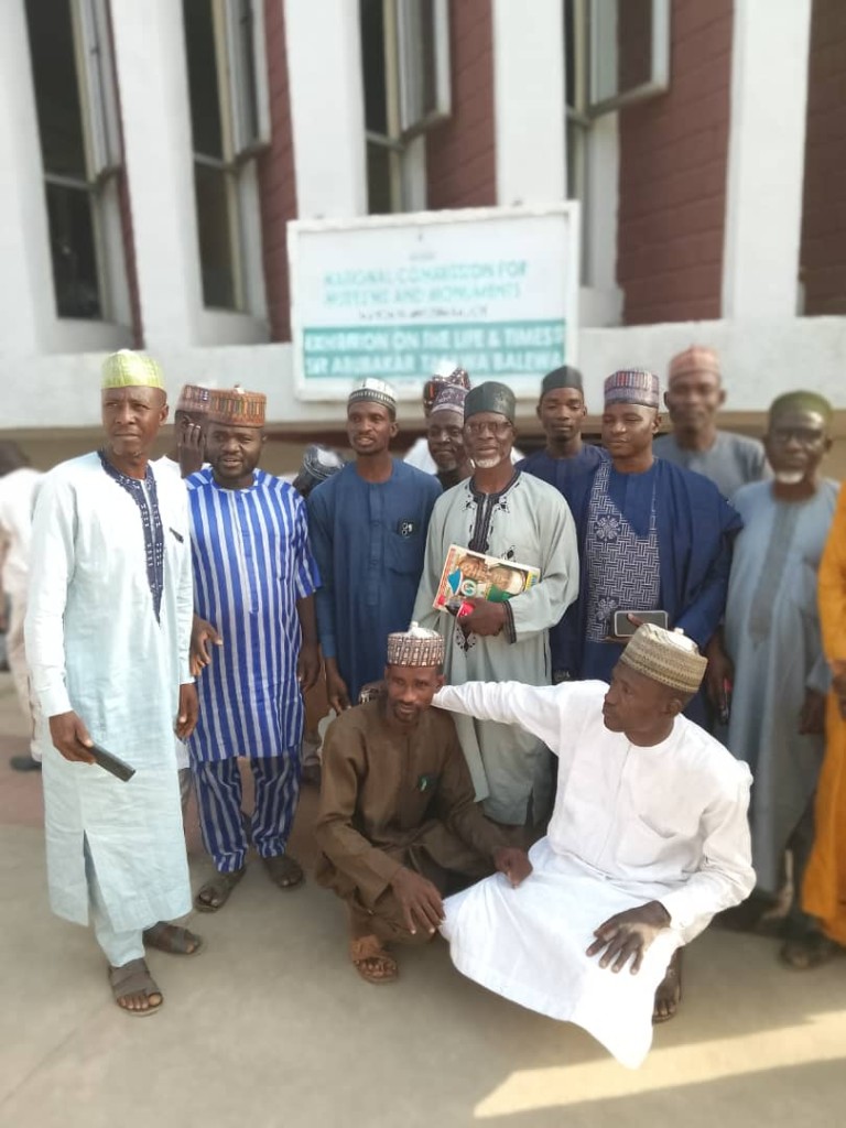 Men from the visit posed outside the National Museum, Bauchi.